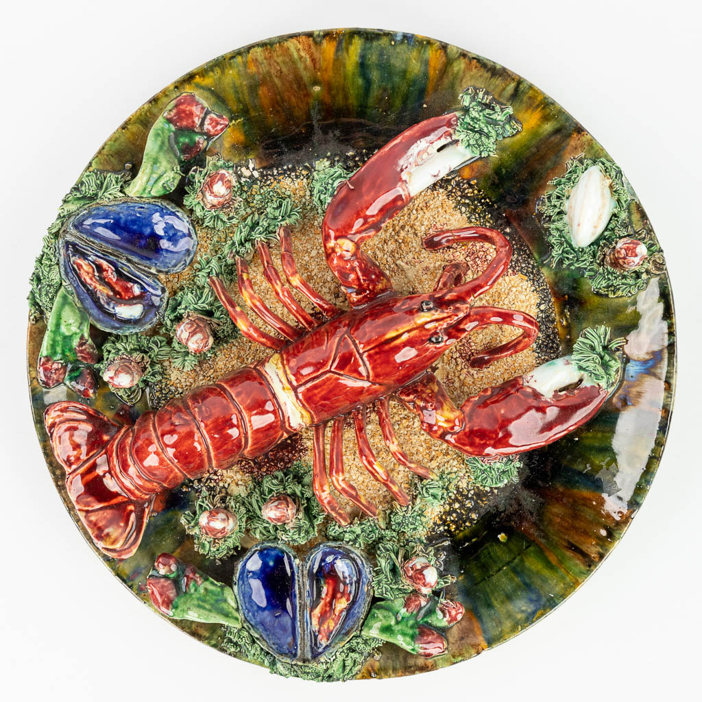 Jose Alvaro Caldas, a plate made of glazed faience, barbotine, decorated with a lobster. Suite de Palissy. 
