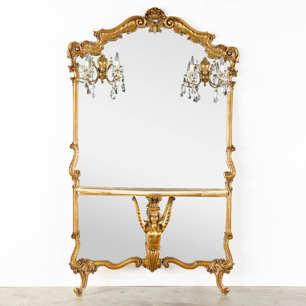 An Italian console table, mirror and wall lamps, gilt, Lodewijk XV stijl. (L:36 x W:131 x H:217 cm)
