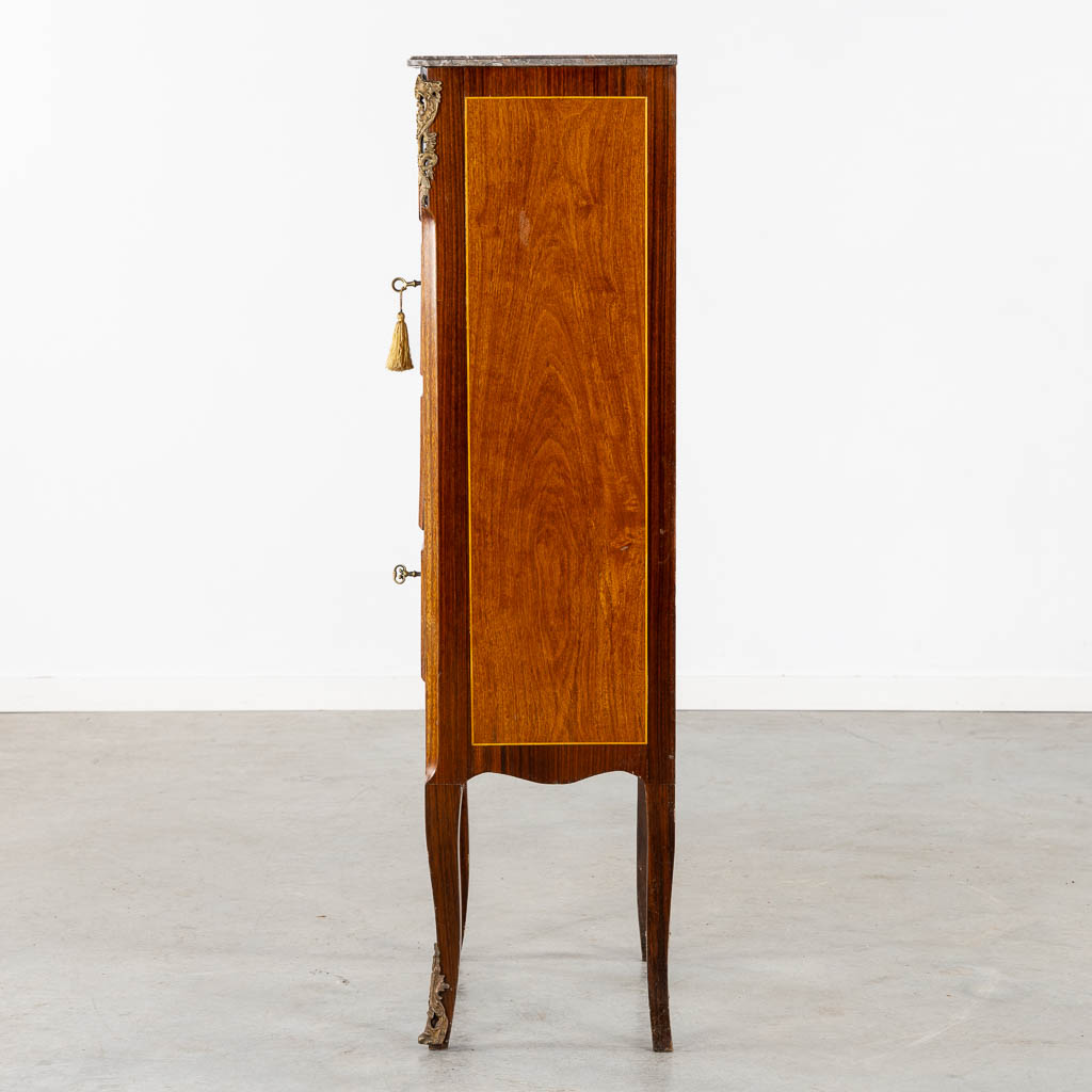 A Secretaire cabinet, Marquetry inlay and mounted with bronze. Circa 1900. (L:34 x W:56 x H:128 cm)