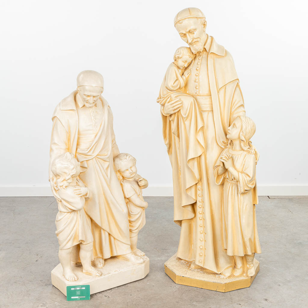 A collection of 2 monochrome patinated plaster statues of Holy Vincentius. (H:105cm)