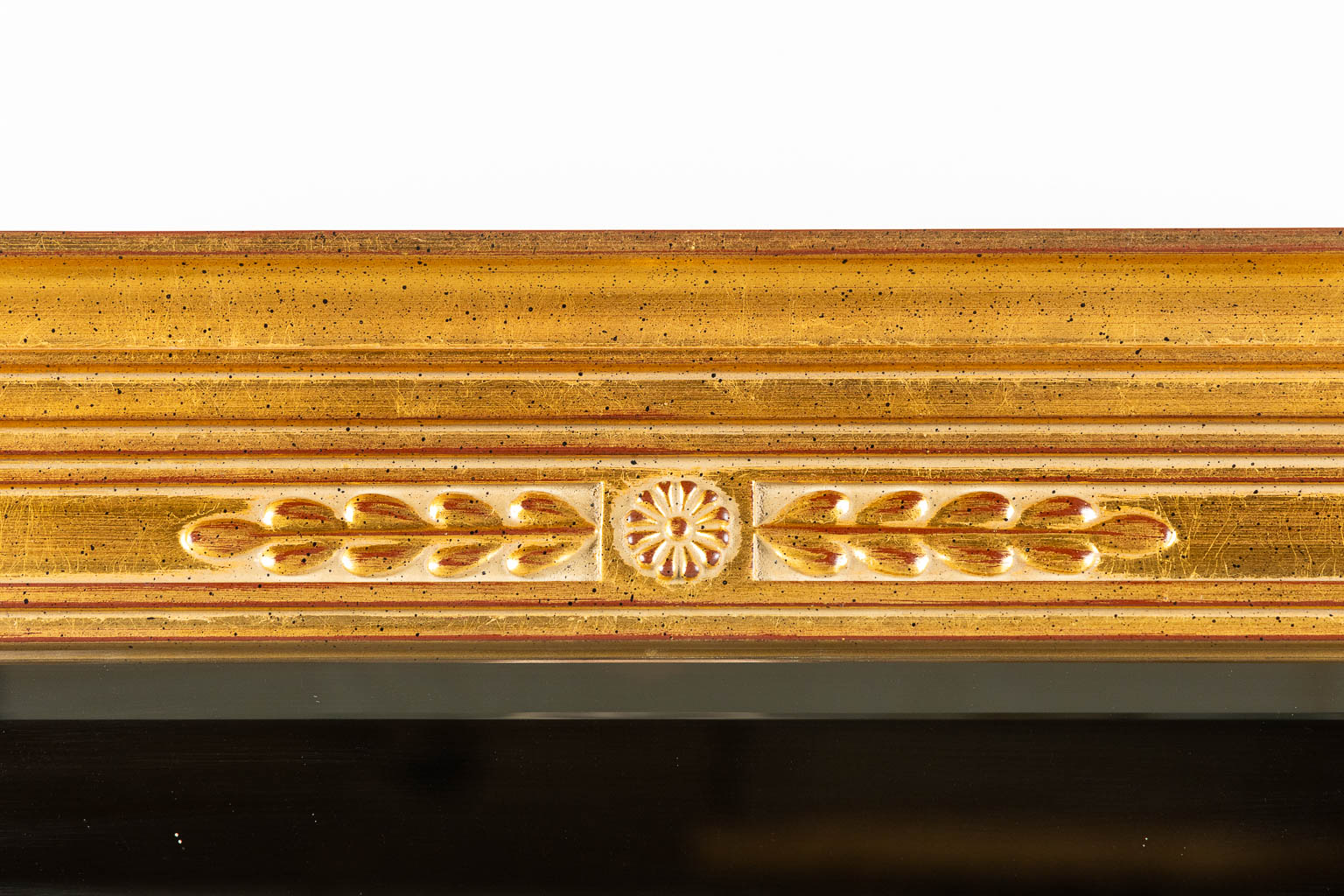 Deknudt, a mirror, gilt wood in Empire style. (W:74 x H:102 cm)