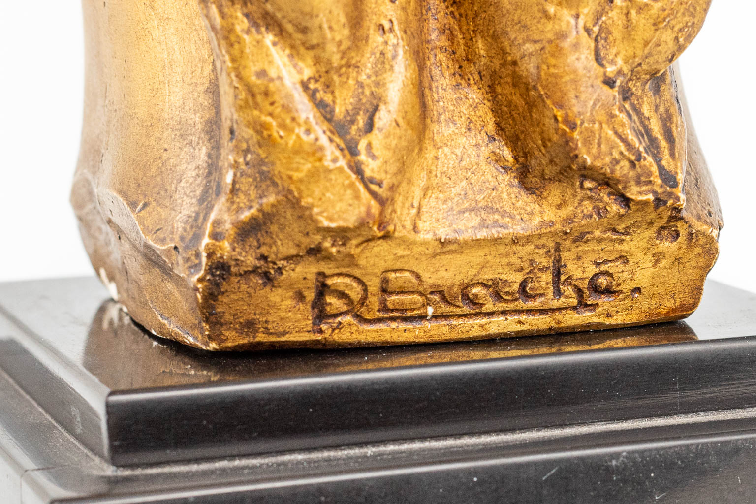 Roger BRACKE (1913-1993) een vergulde buste gemaakt uit plaaster. 