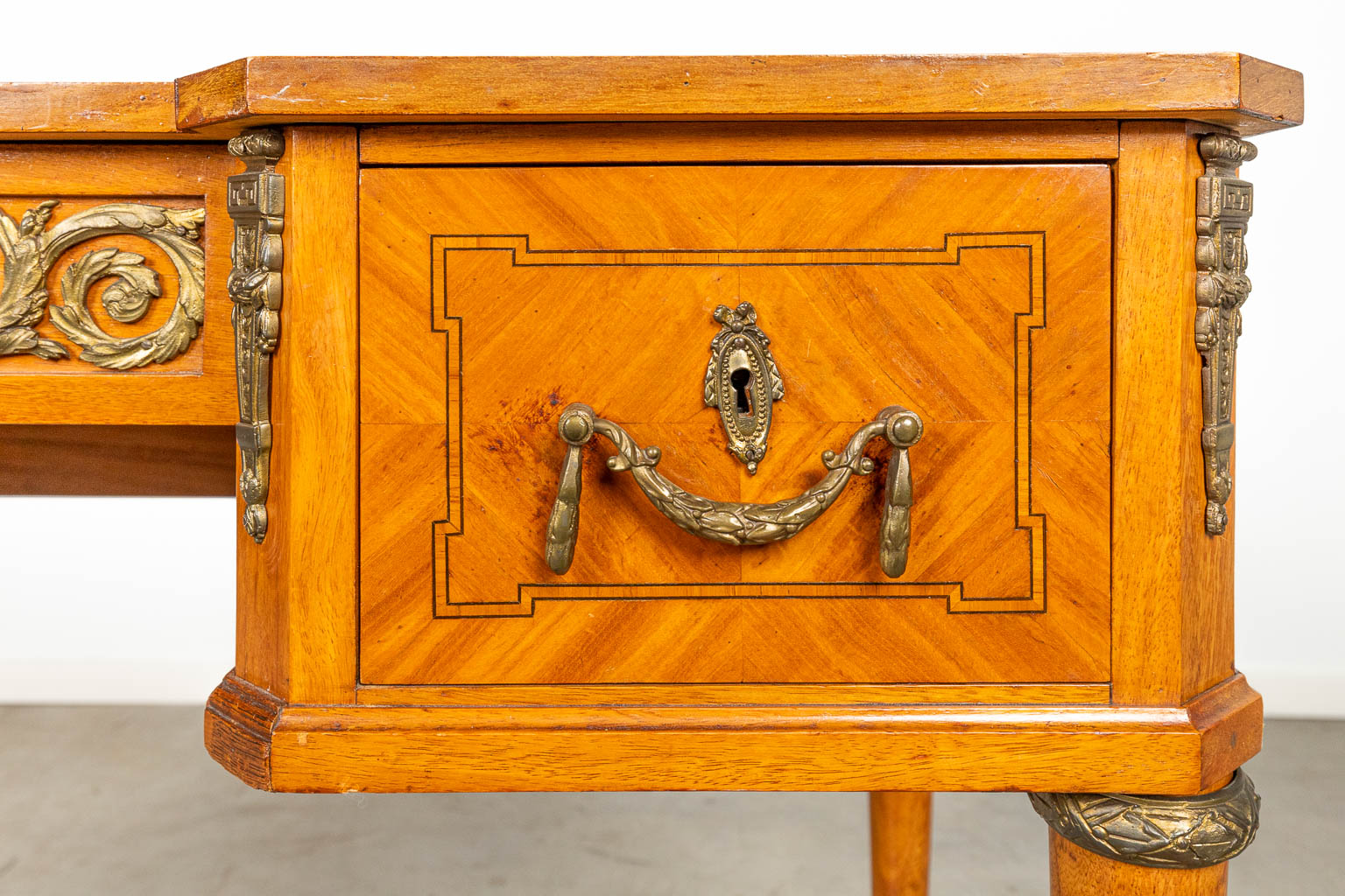 A desk made in Louis XVI style, around 1900. 