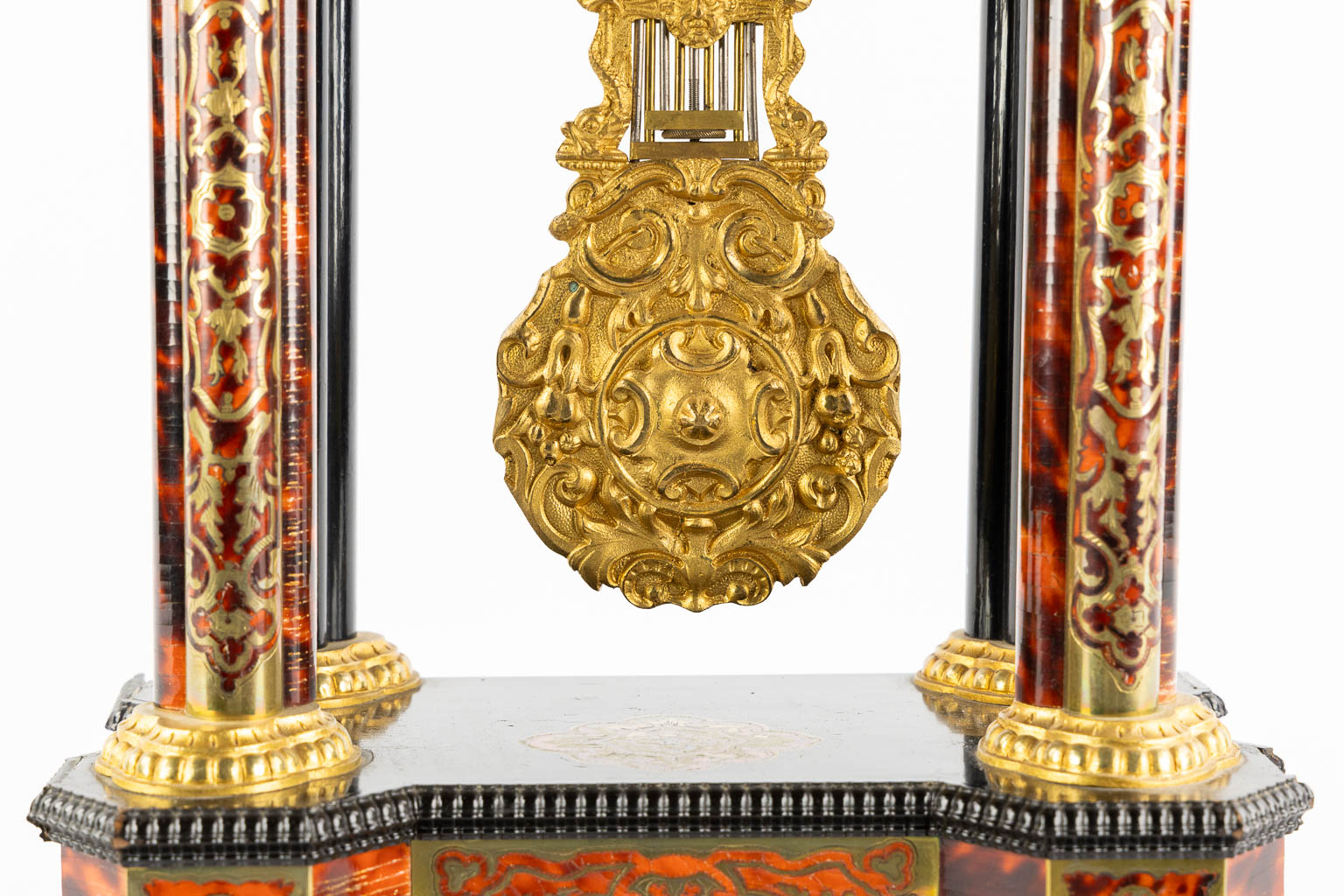 A mantle clock, Boulle marquetry inlay for the Swedish Market, Napoleon 3, 19th C. (L:14 x W:25 x H:51 cm)