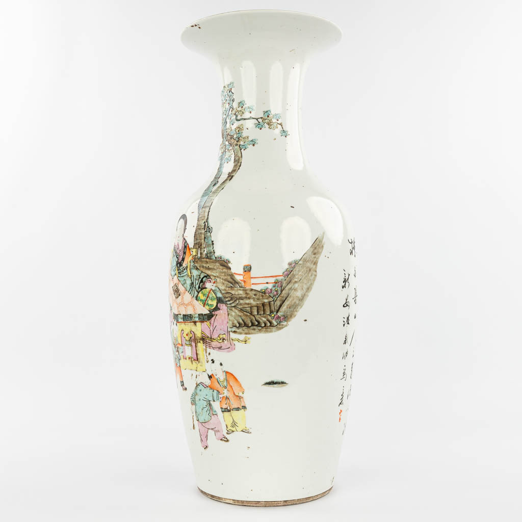A Chinese vase made of porcelain and decorated with ladies and children in the garden. (H:58cm)
