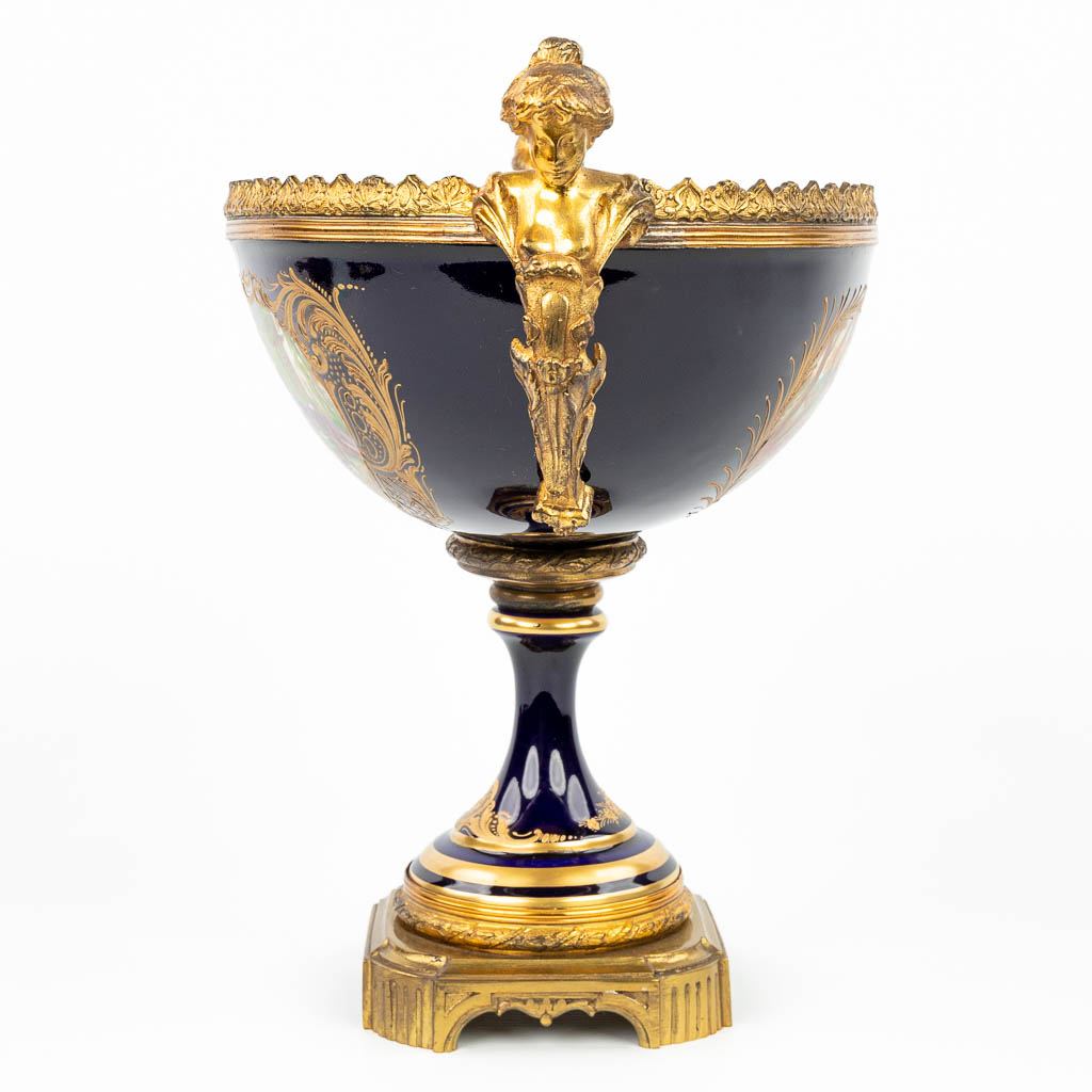 A table centrepiece made of porcelain and mounted with bronze. Sèvres. (H:33cm)