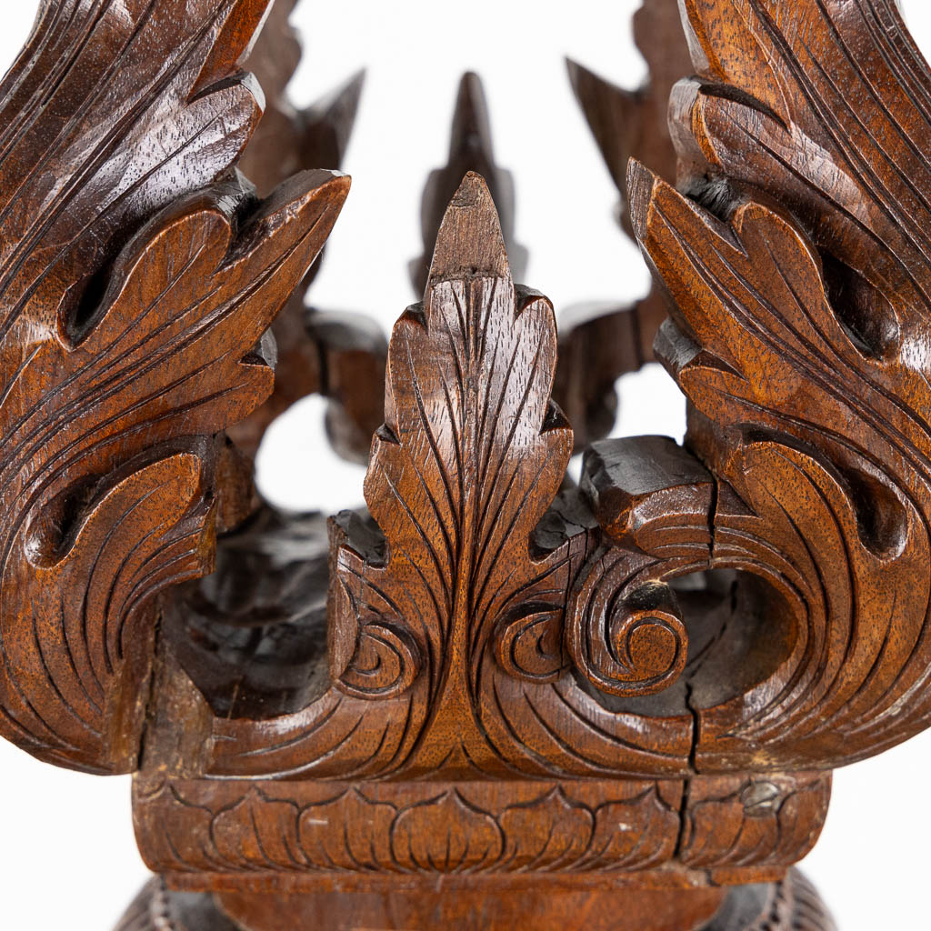 A Oriental hardwood pedestal with a sculptured dragon. (W:42 x H:125 cm)
