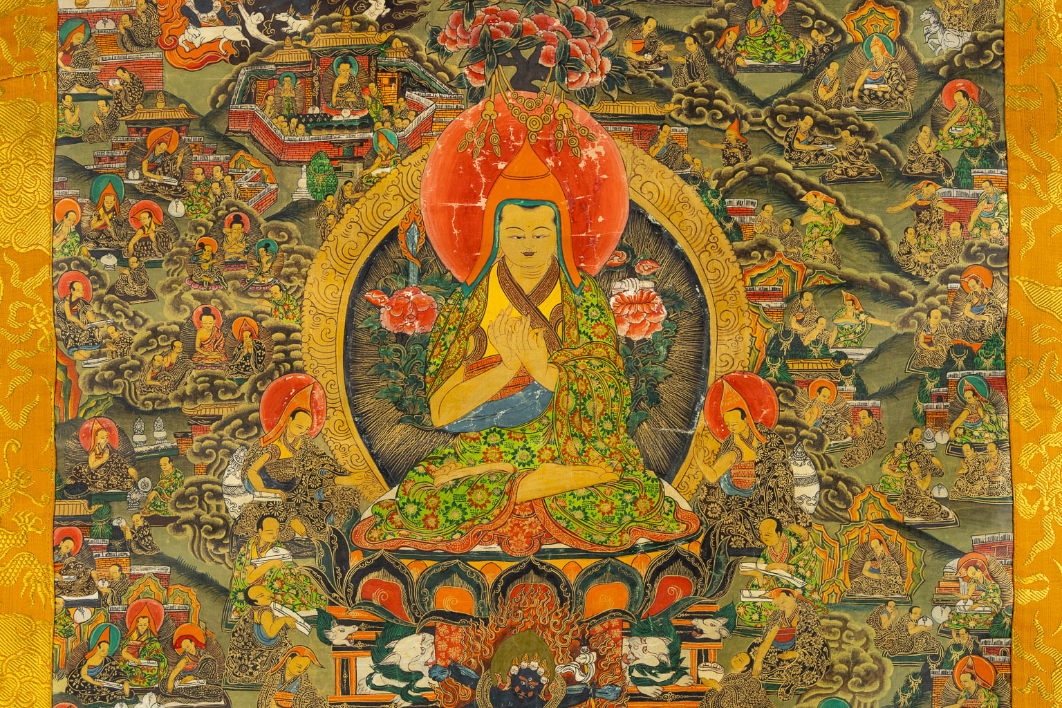 An Oriental thankga, painted on silk. (W:79 x H:127 cm)