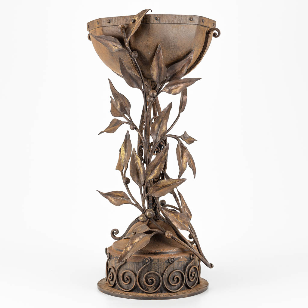 A large wrought iron beaker or chalice, made around 1900. 
