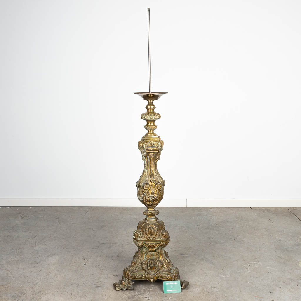 A large candlestick made of bronze and decorated with figurines. (H:125cm)