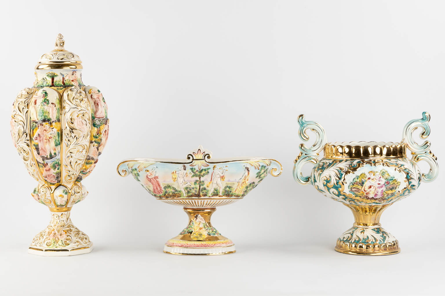 Six large bowls and vases, glazed faience, Capodimonte, Italy. (H:52 x D:23 cm)