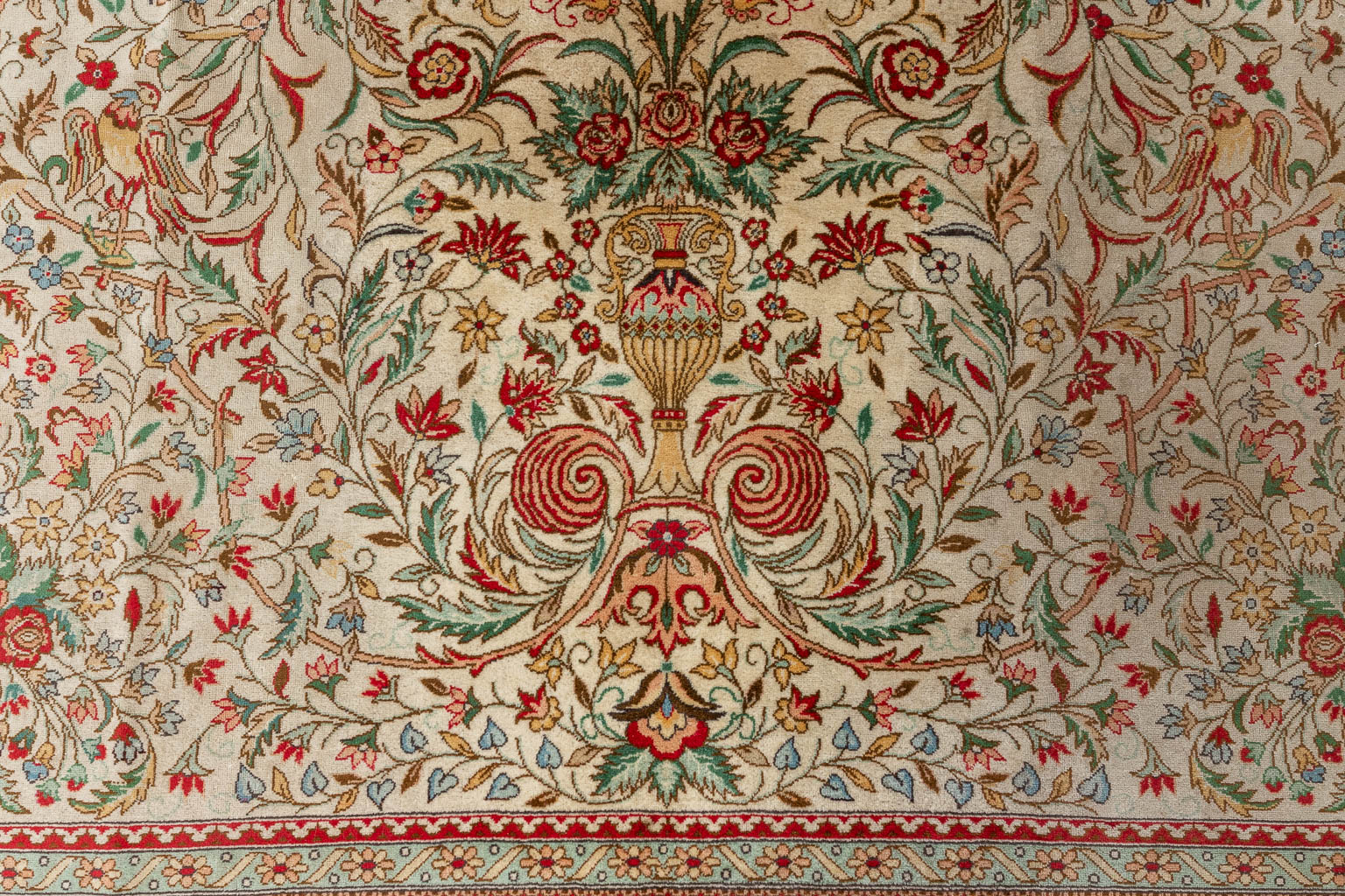 An Oriental hand-made carpet, Tabriz. (D:354 x W:254 cm)