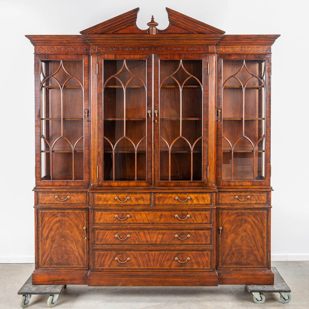 A display cabinet made by Jonathan Charles in the UK. 20th century. (H:239cm)