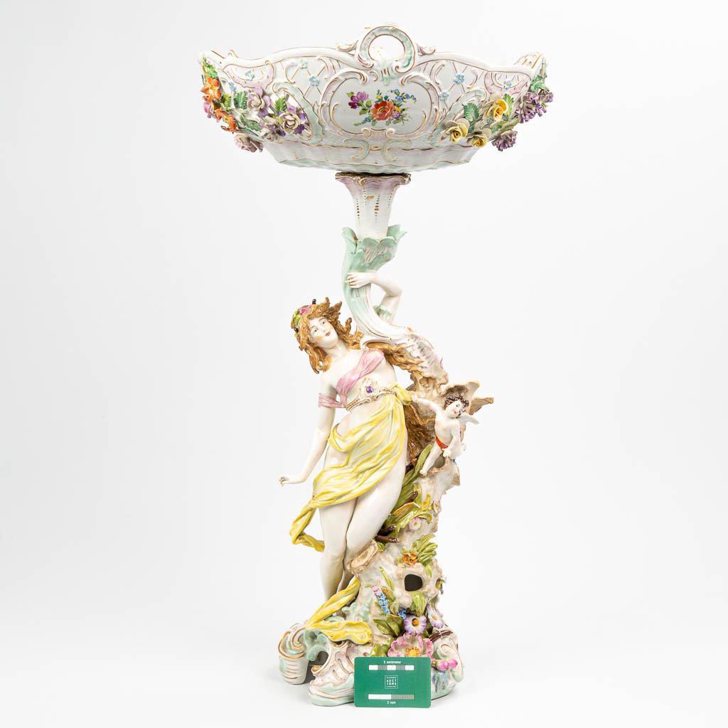 An exceptional table centrepiece made of porcelain with hand-painted decor and figurines. Made in Germany