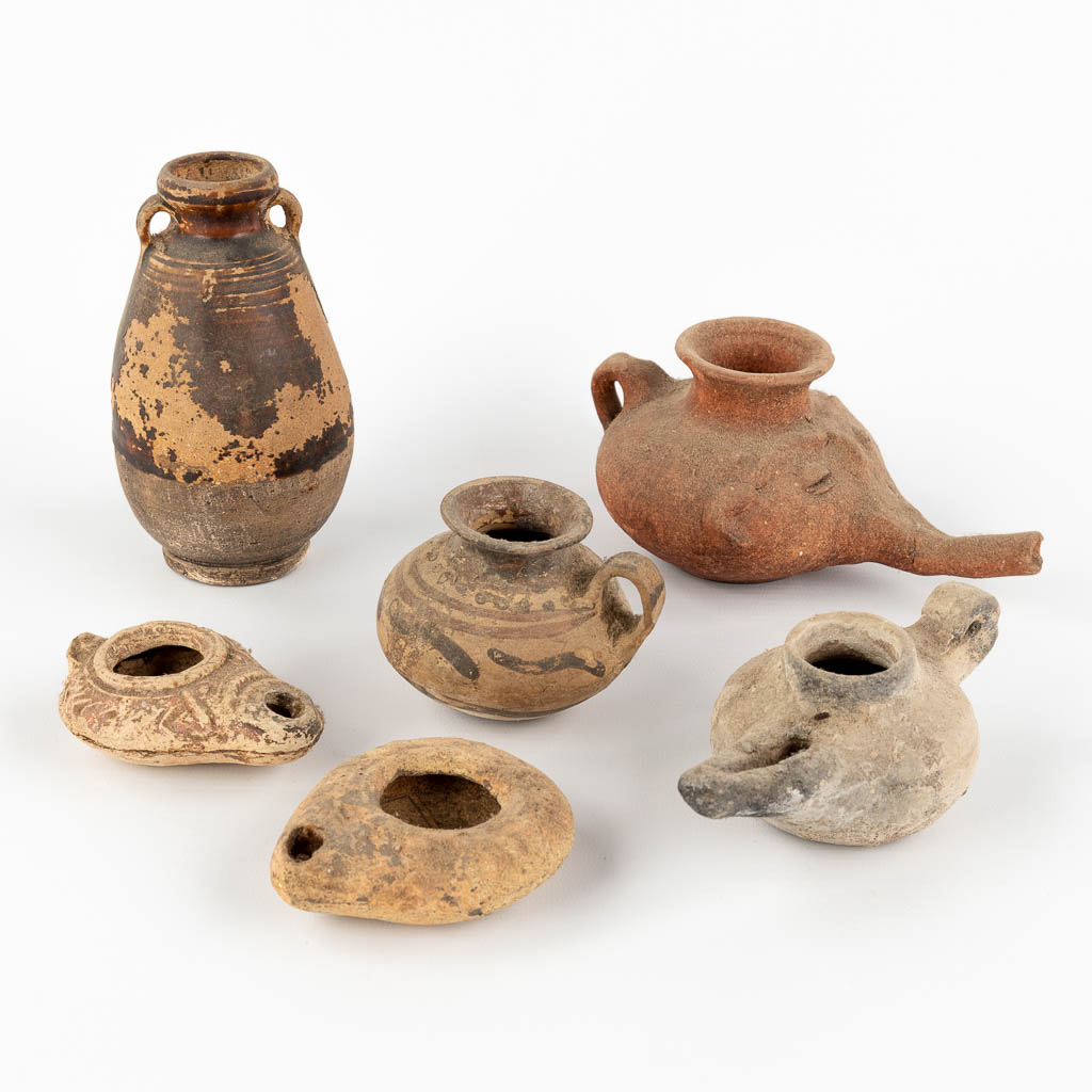 Vassels and oil lamps, 6 pieces, Possibly of Roman origin. (H:13 cm)