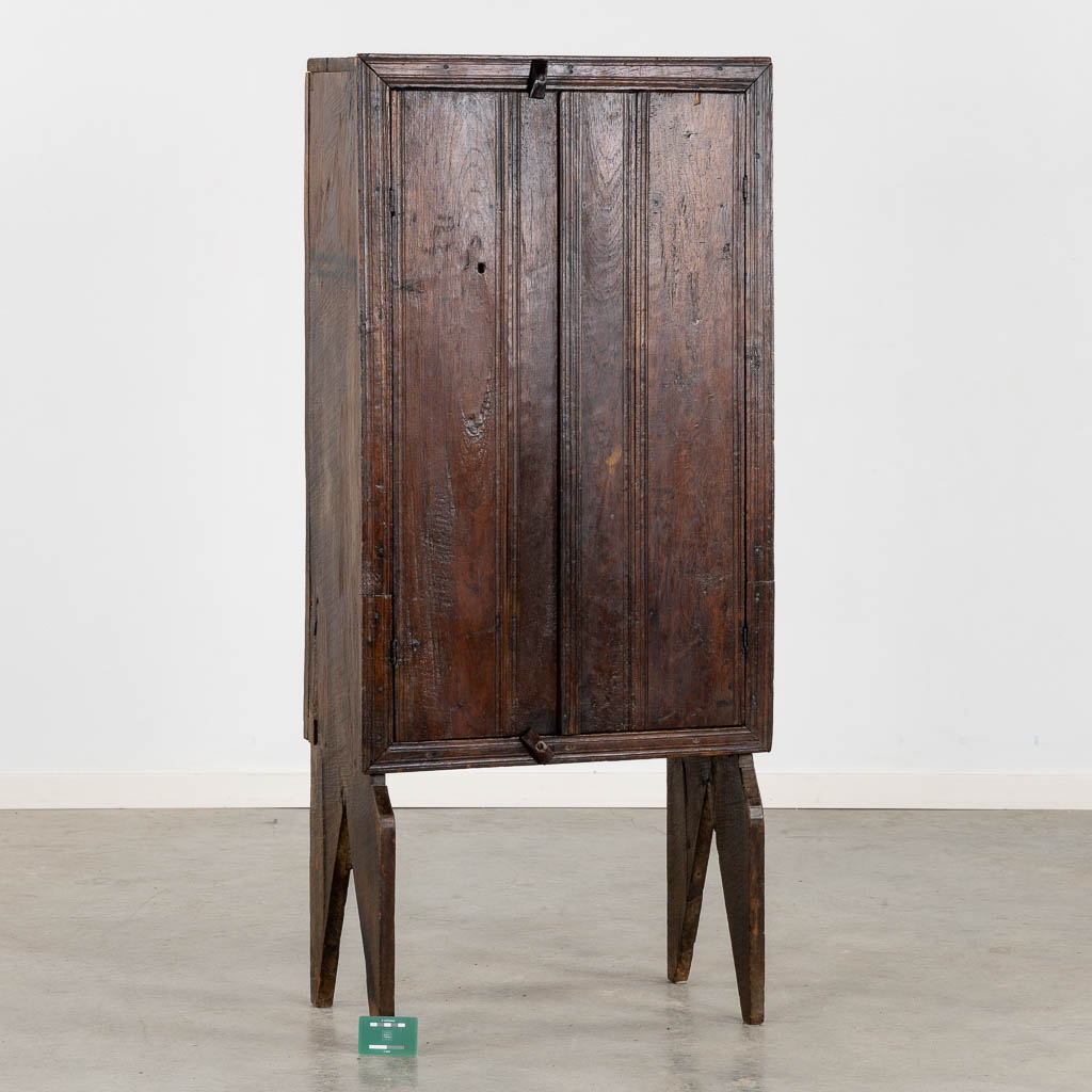 An antique two-door cabinet, hardwood. (L:36 x W:64 x H:143 cm)