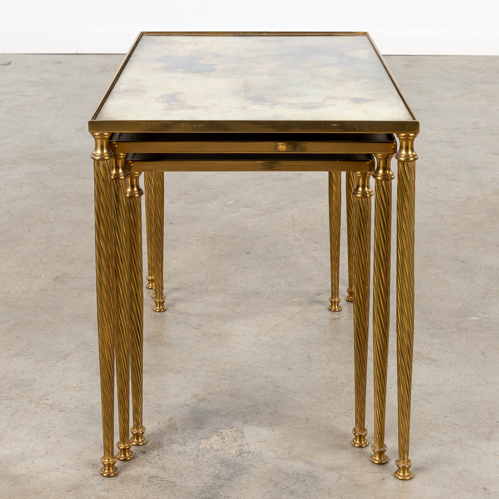 A set of 3 matching side tables with tinted glass, in the style of Maison Jansen. (D:34 x W:54 x H:39 cm)