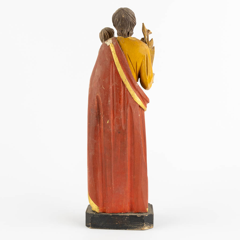 A collection of wood sculptured Corpus Christi and Saints. 19th and 20th C. (W:38 x H:53 cm)