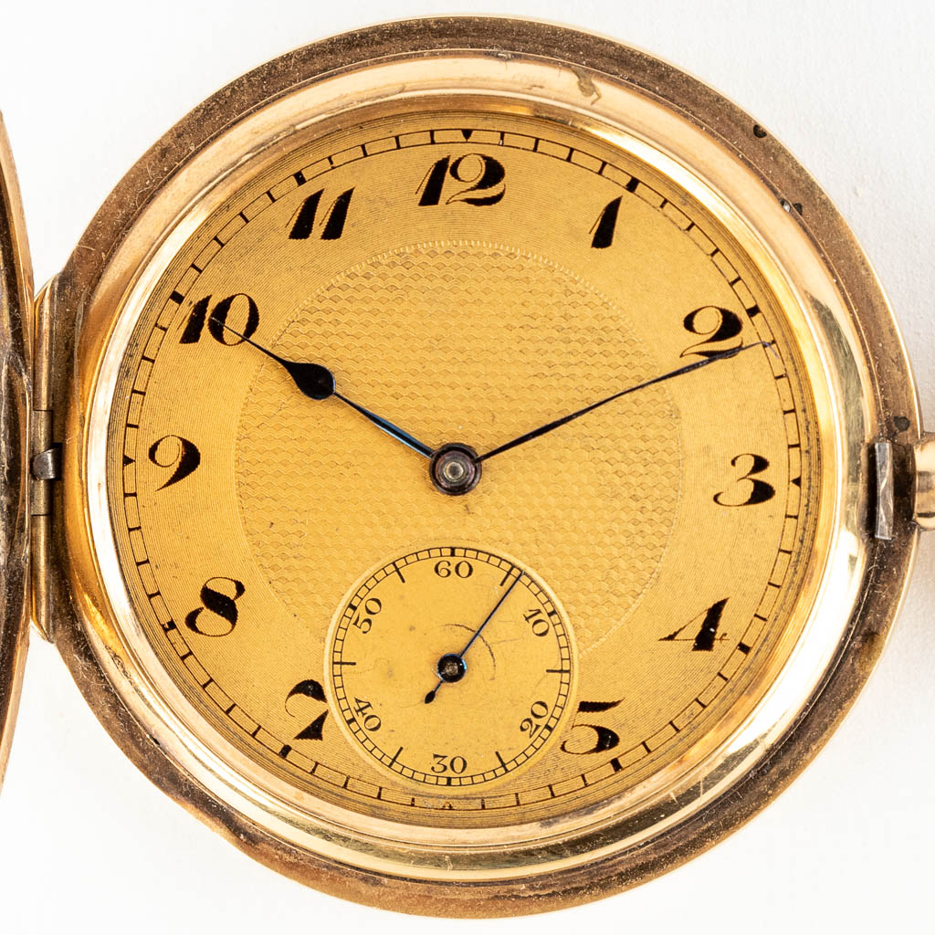 A 14 karat gold pocket watch. 20th C. (W:51 cm)