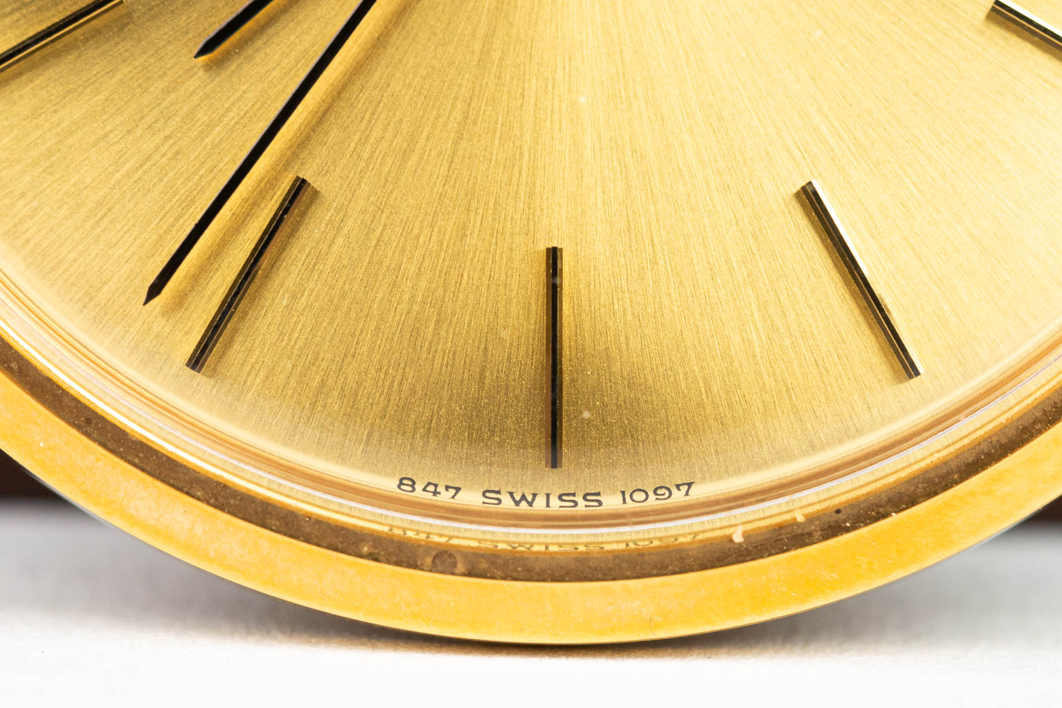 A mechanical pocket watch made by Longines, gold plated. 