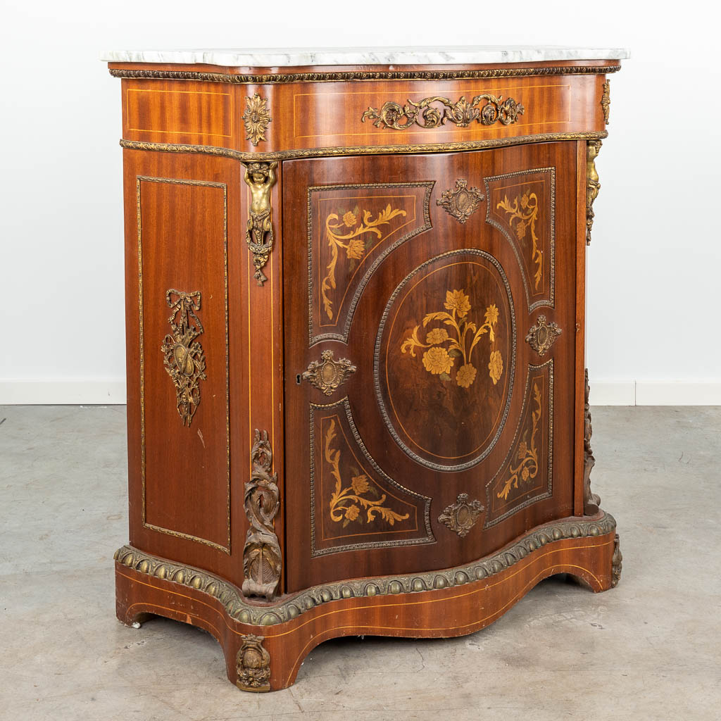 A one door cabinet decorated with marquetry inlay and mounted with bronze and a marble top. (H:102cm)
