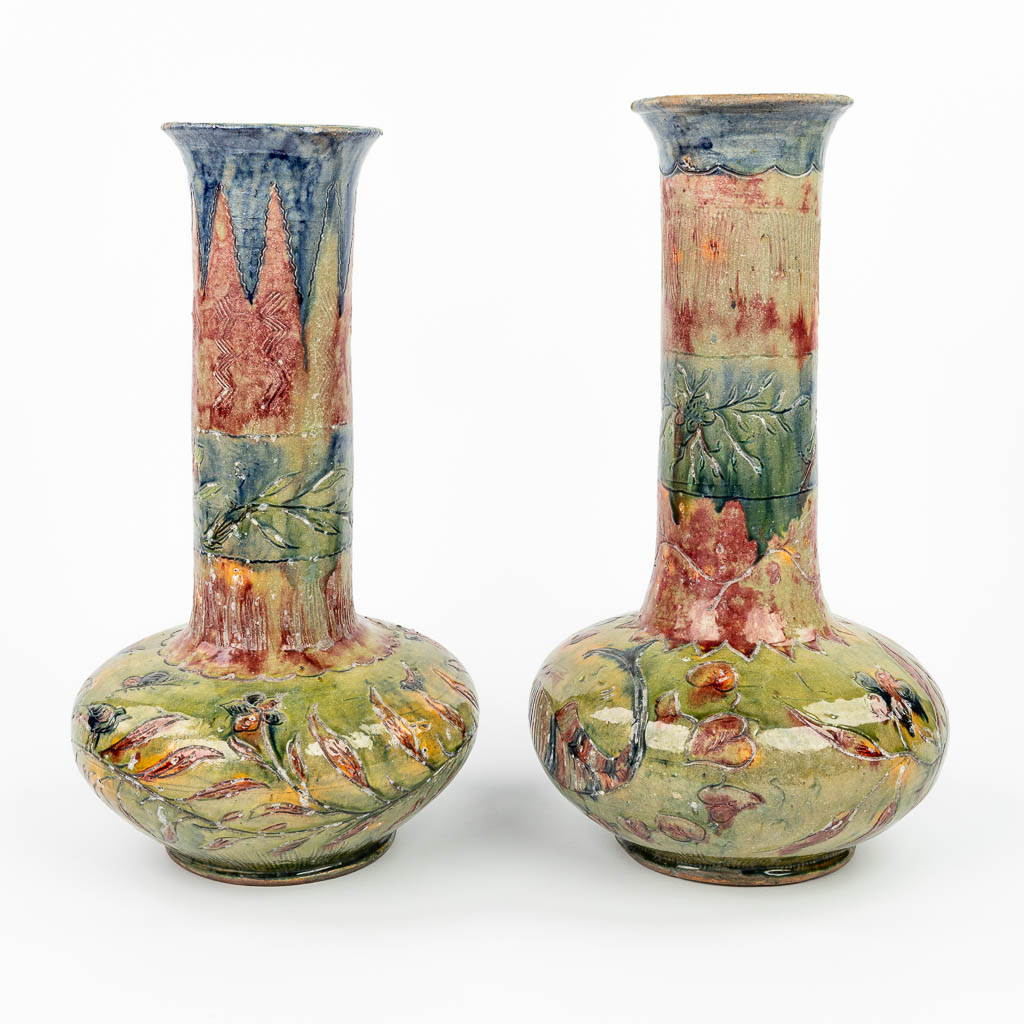 A pair of exceptional vases made of Flemish Earthenware in Bredene. (H:46cm)
