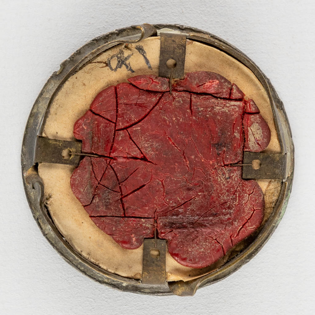 A sealed theca with a relic: Ex Ossibus Sancti Damasi P.C.