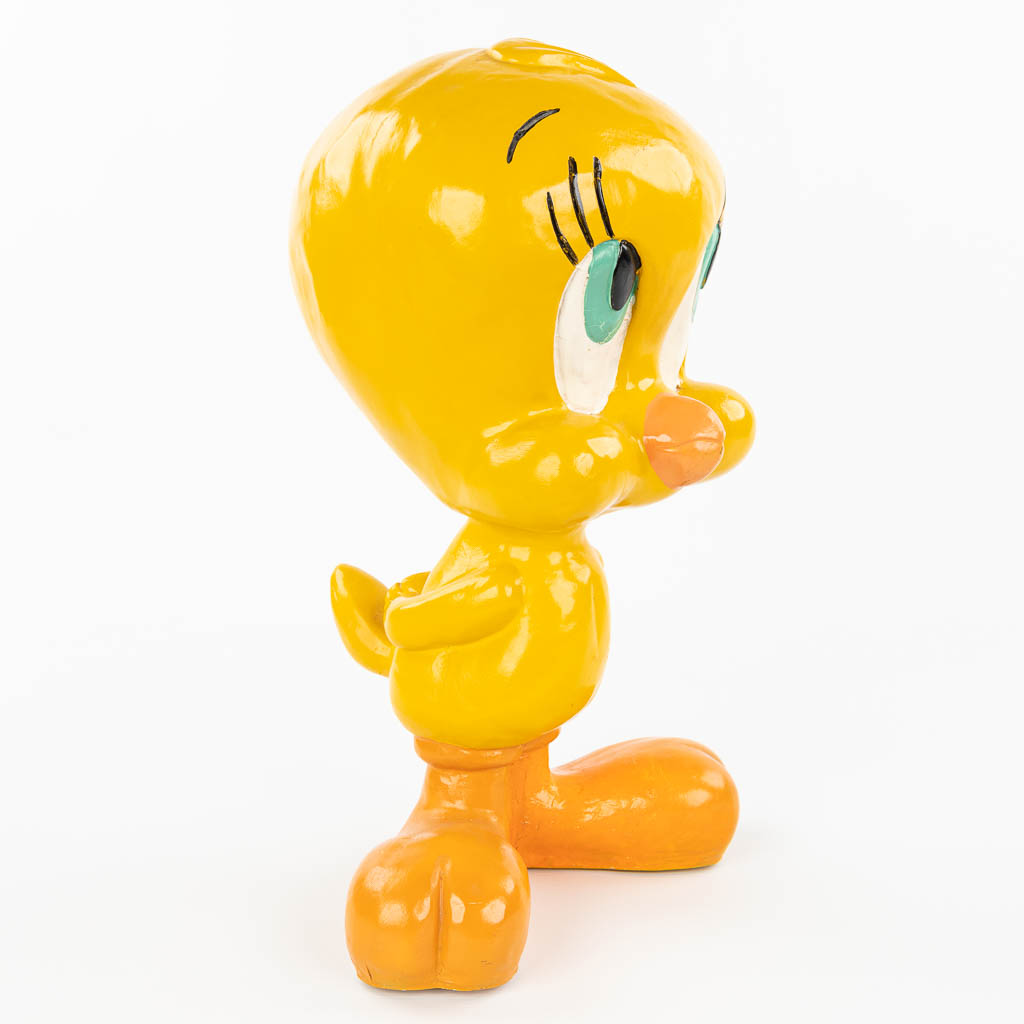 A vintage statue of Tweety, made of patinated resin. (H:42cm)