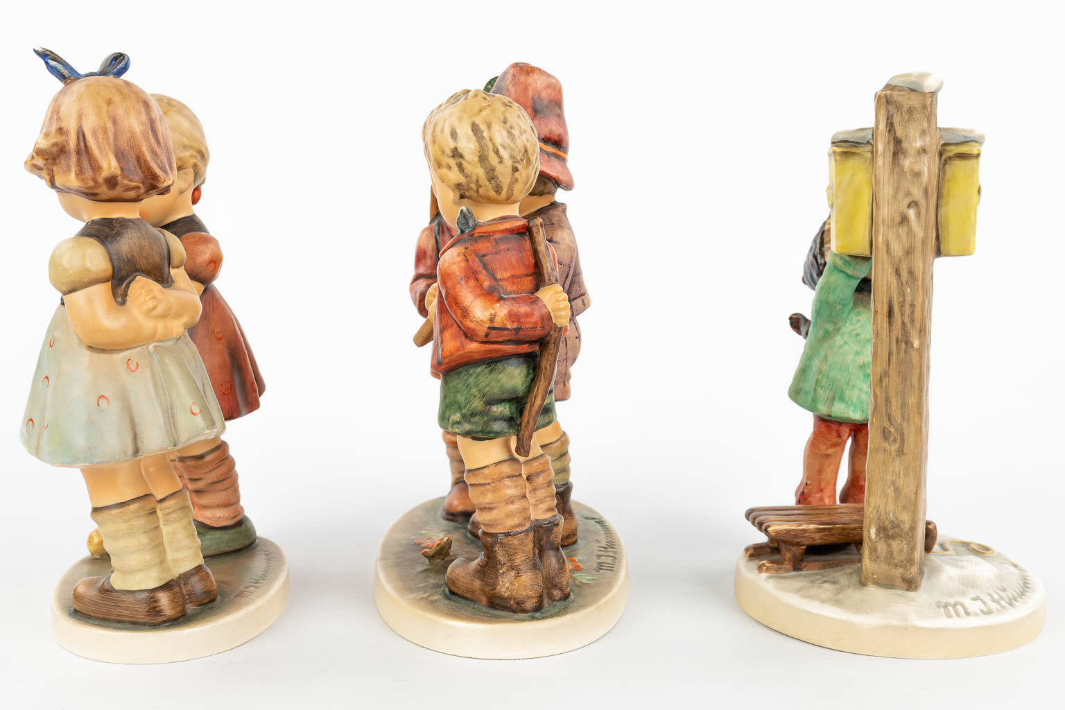 A collection of 3 statues made by Hummel. (H:19cm)