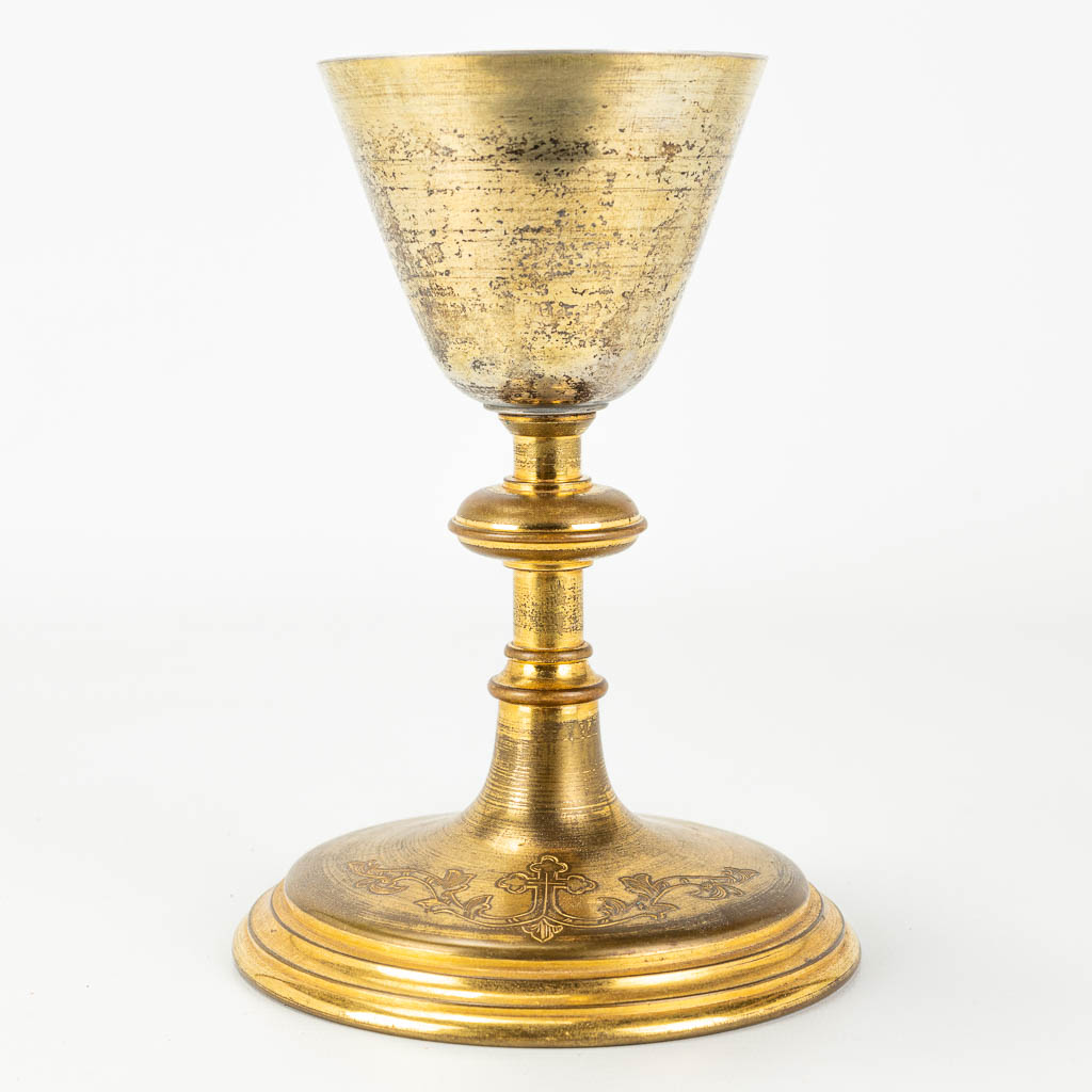 A gilt neogotich chalice, made of gold-plated brass.