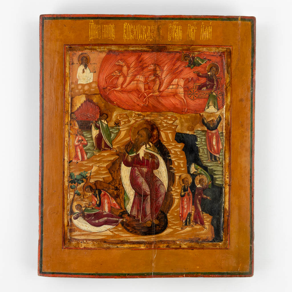 Een Oost-Europese icoon 'Hemelvaart van Elias', 18de/19de eeuw. (W:30 x H:35,5 cm)