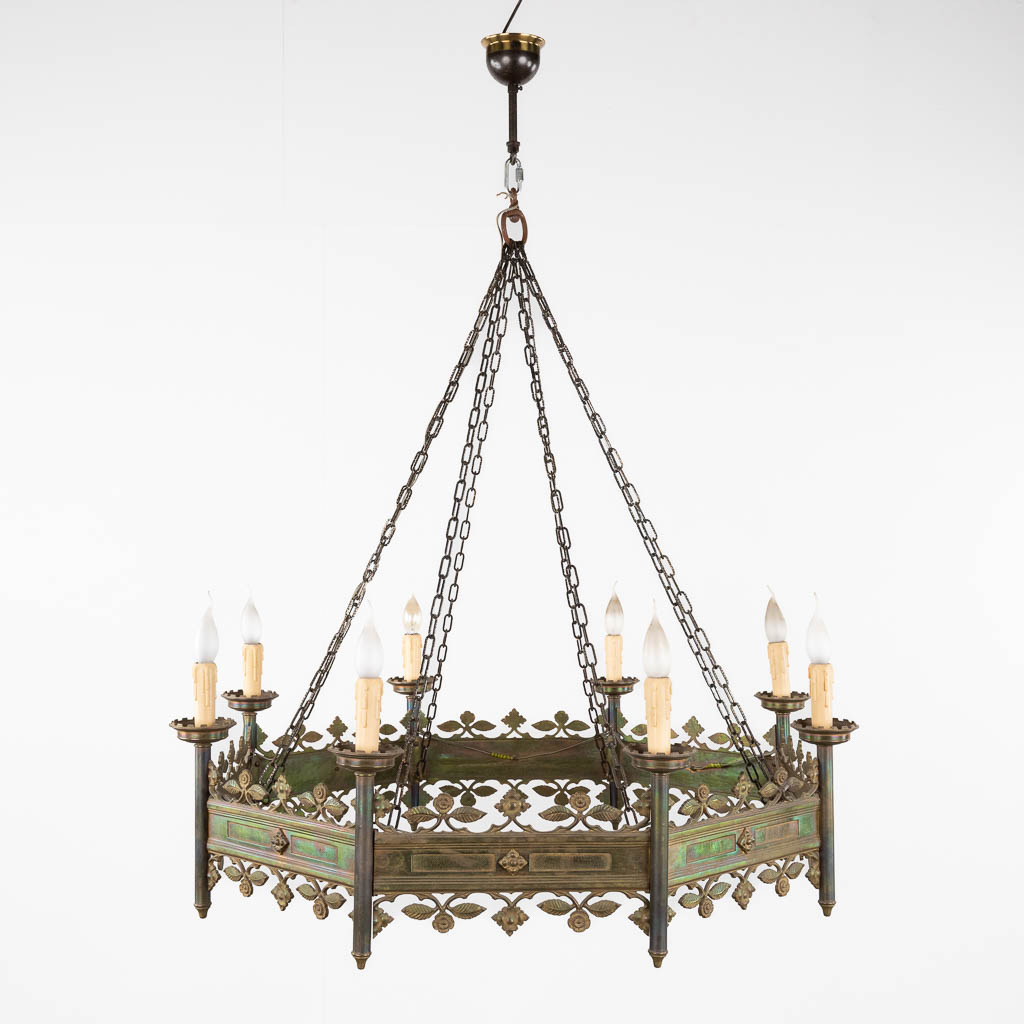 A large church chandelier in octagonal shape, bronze in Gothic Revival style. 19th C. (H:40 x D:101 cm)