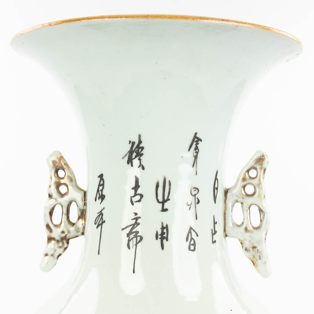 A Chinese vase made of porcelain and decorated with ladies in a garden. (H:57cm)