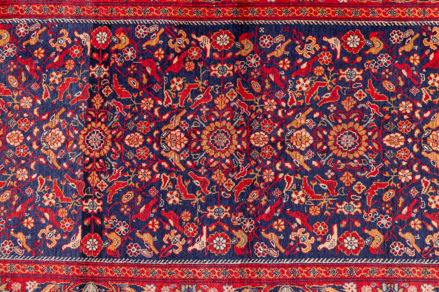 An Oriental hand-made carpet, Kashan. (D:186 x W:100 cm)
