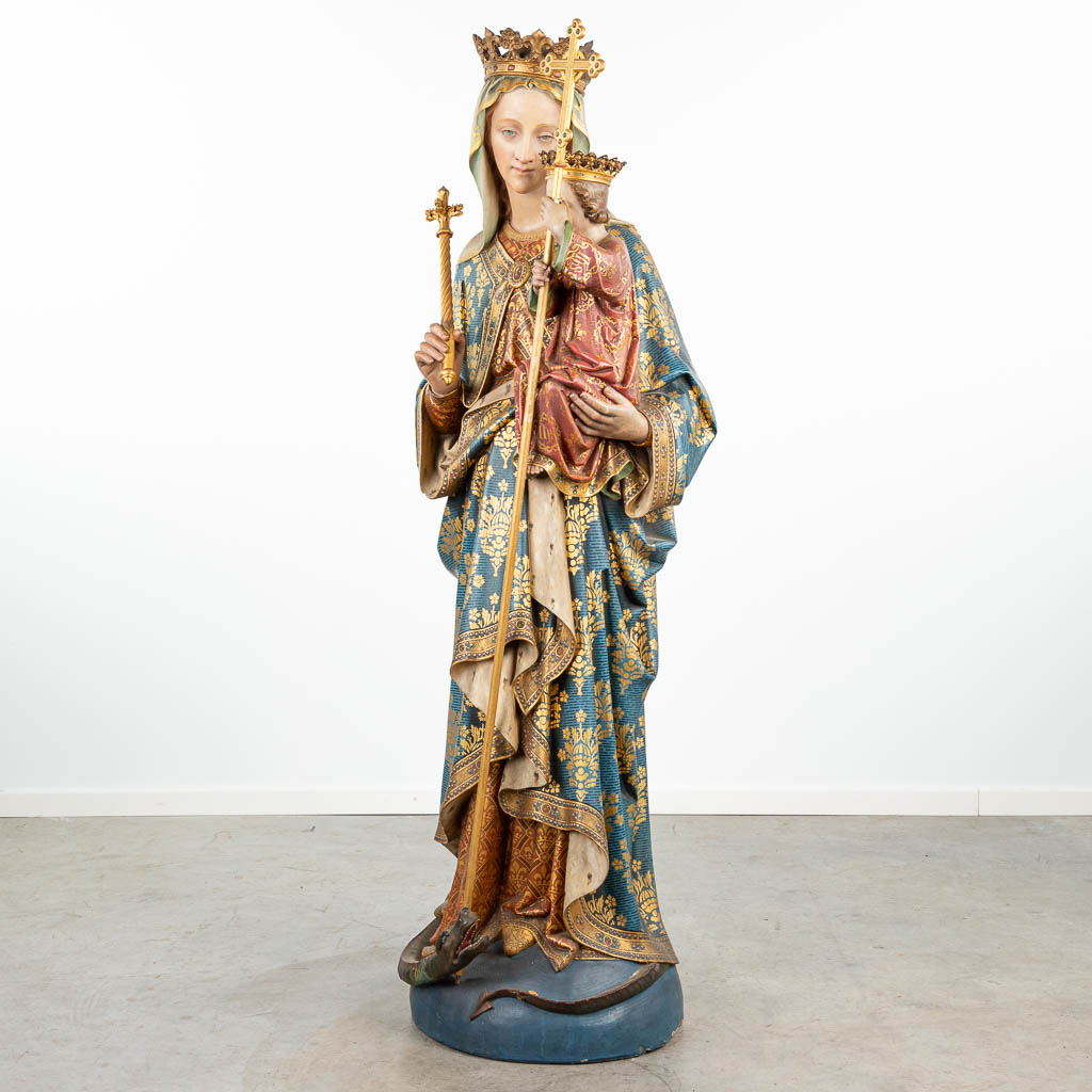 A life-size statue of Madonna with Child trampling the serpent, made of polychrome terracotta. (H:168cm)