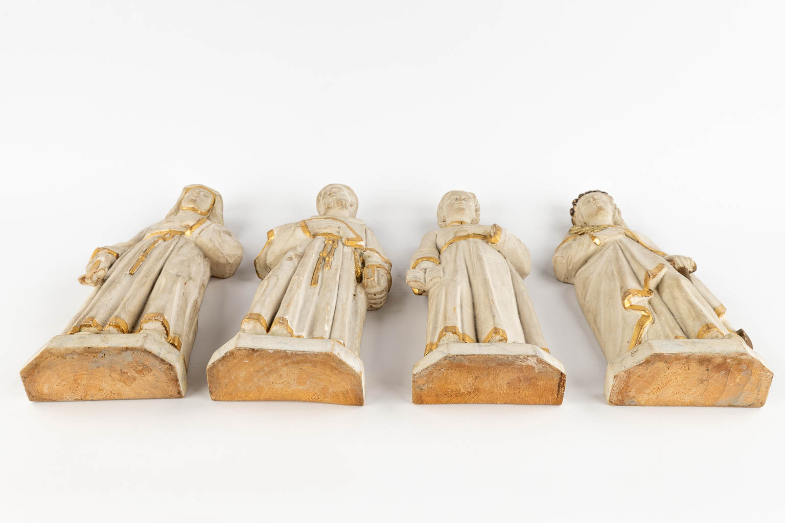 Four wood sculptured Holy figurines, 19th C. (H:39 cm)