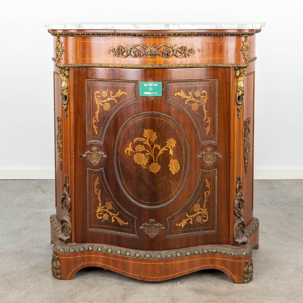 A one door cabinet decorated with marquetry inlay and mounted with bronze and a marble top. (H:102cm)