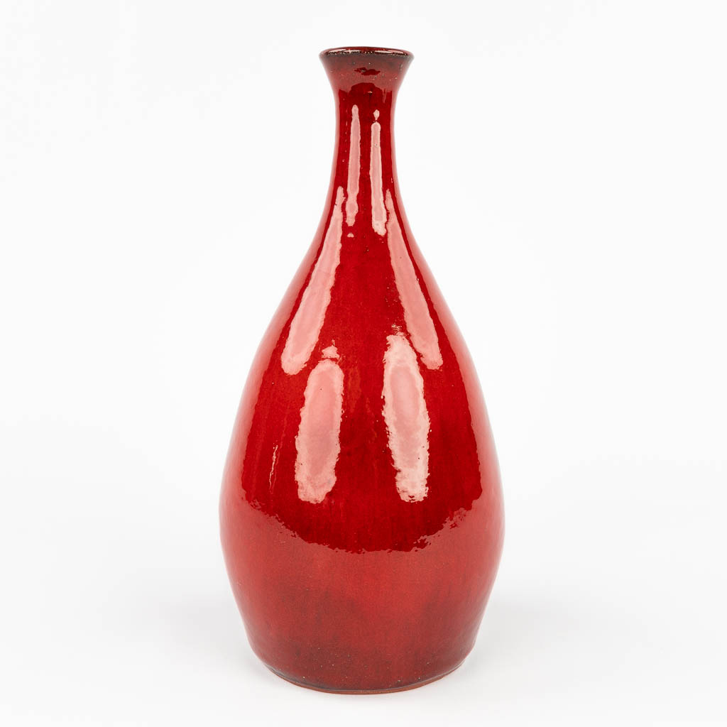 Léon GOOSSENS (XX) 'Red Vase' made of glazed ceramics. (H:30 cm)