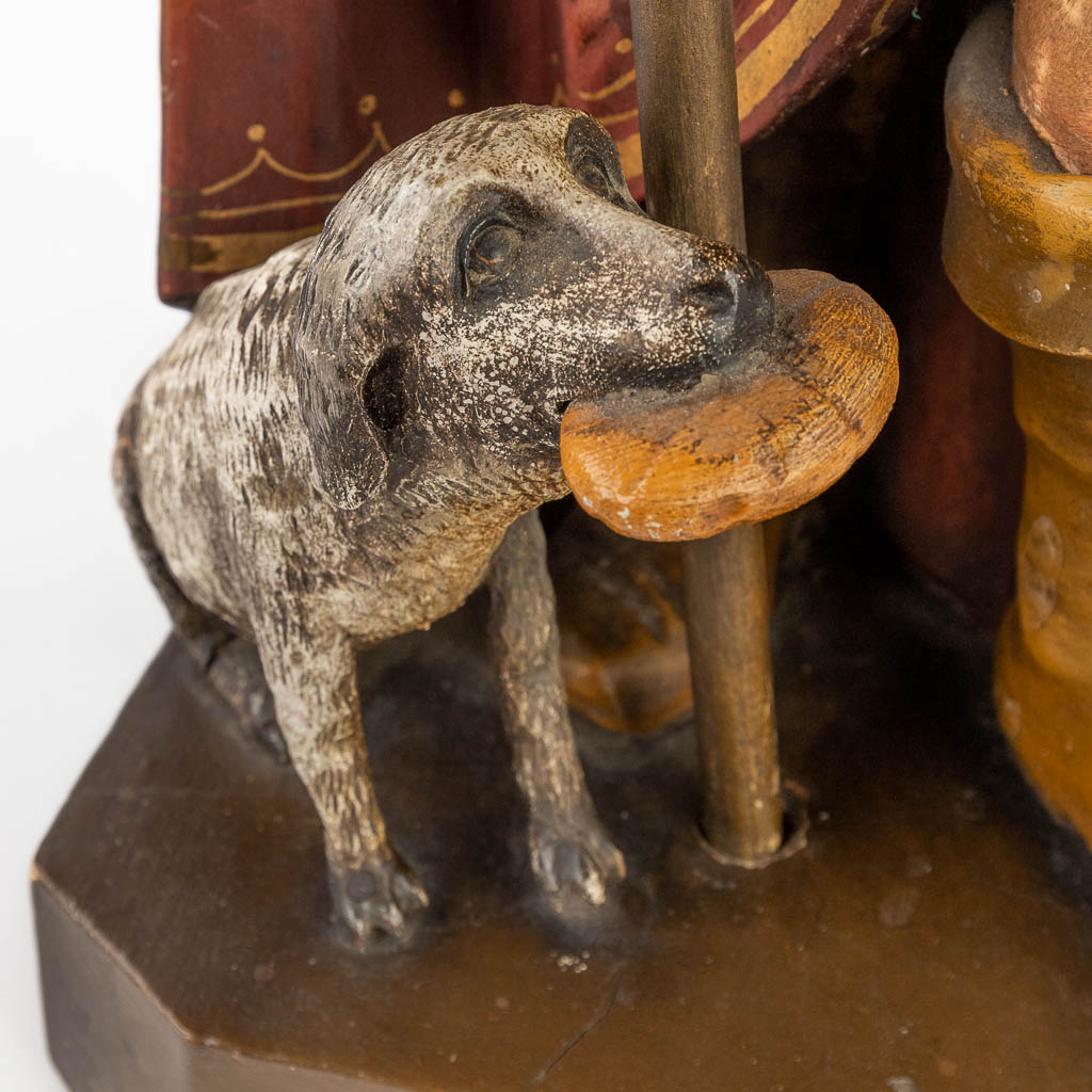 Saint Rochus and his dog, sculptured wood, 19th C. (D:20 x W:22 x H:78 cm)