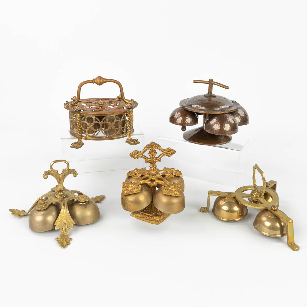 An assembled collection of 5 Altar Bells, made of various metal types. (H:15cm)