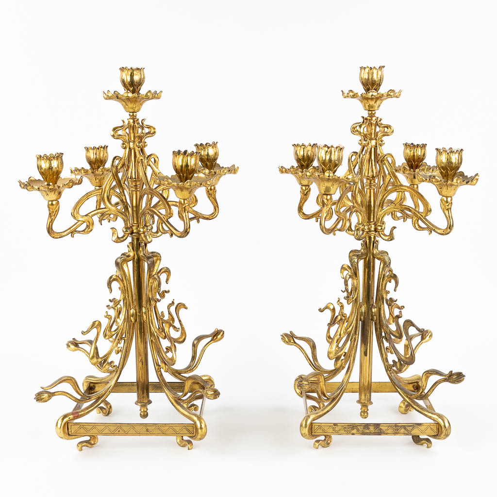 A pair of candelabra, brass in art nouveau periode. Circa 1900. 