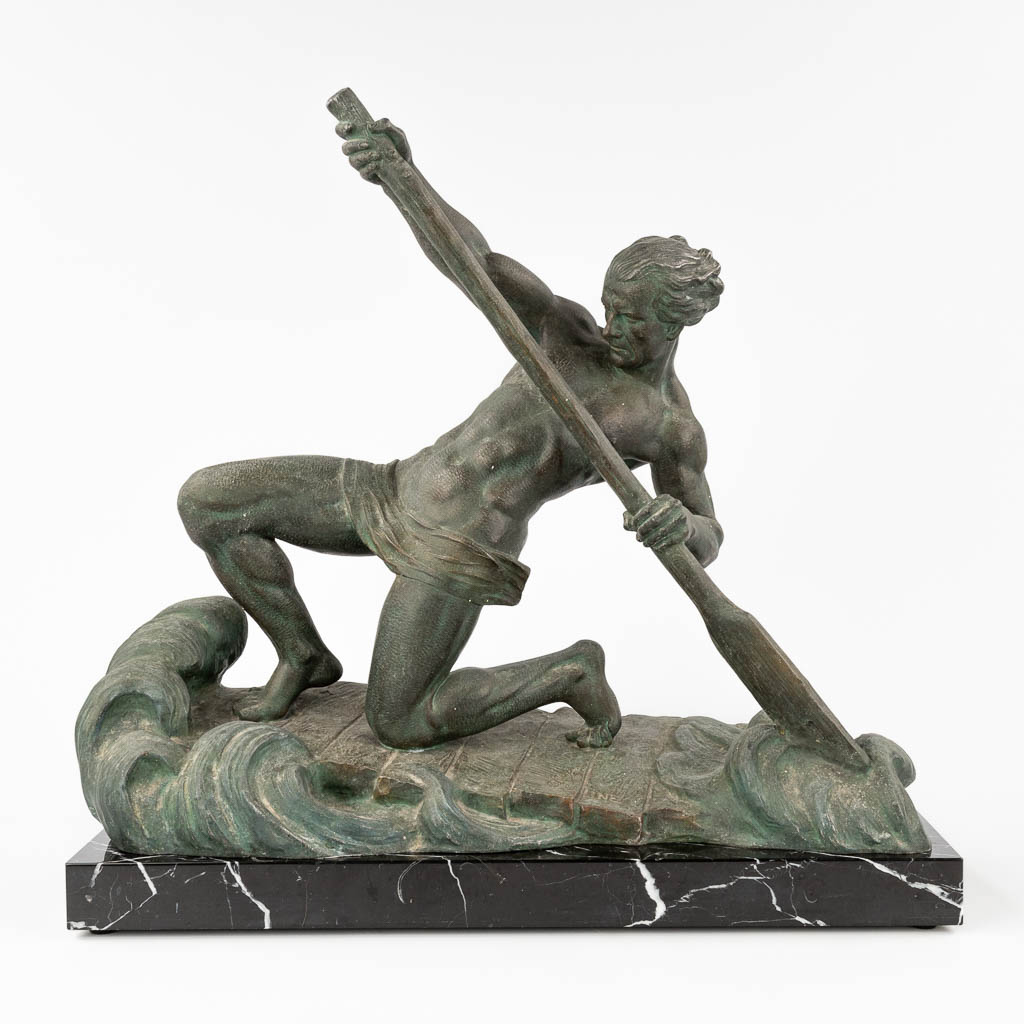 Alexandre OULINE (act.1918-1940) 'Le Rameur' a statue, spelter, art deco style. Circa 1920. (L: 20 x W: 52 x H: 49,5 cm)