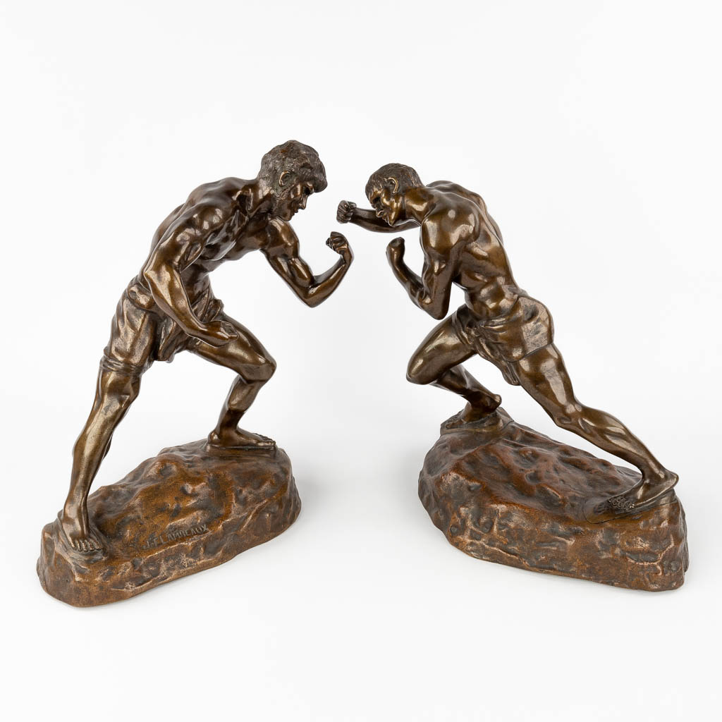 Jef LAMBEAUX (1852-1908)(naar) 'Les Lutteurs' een paar beelden gemaakt uit brons. (L: 22 x W: 36 x H: 38 cm)