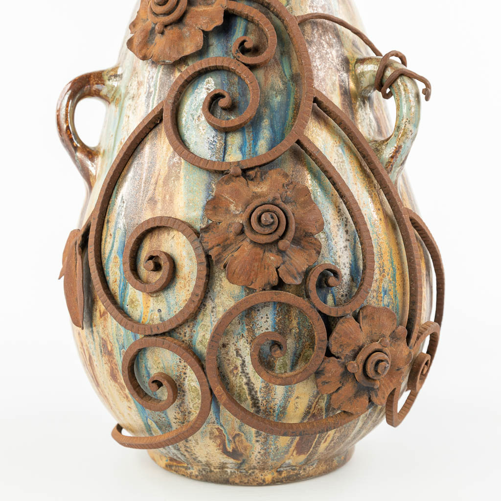 Roger GUERIN (1896-1954) a vase made of glazed grès and mounted with wrought iron. (H:32cm)