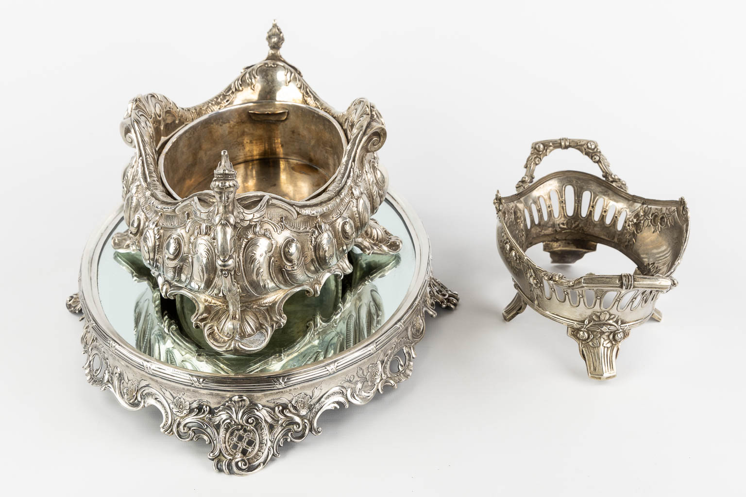 A large table centerpiece, silver, Germany. Added a basket. Circa 1900. (L:38 x W:54 x H:23 cm)