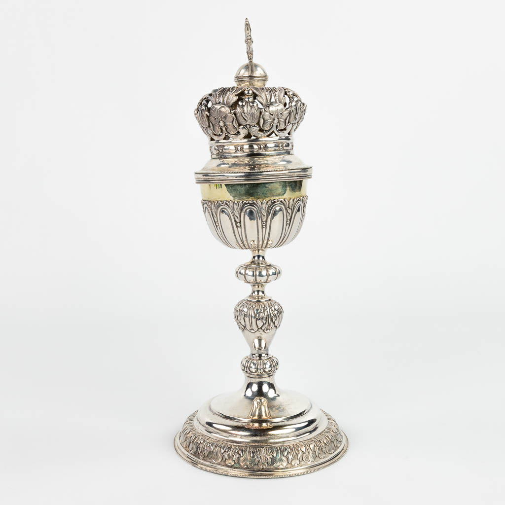 A ciboria made of silver with an open-worked crown. Marked with double Janus, 833/1000. 508g. (H:32cm)