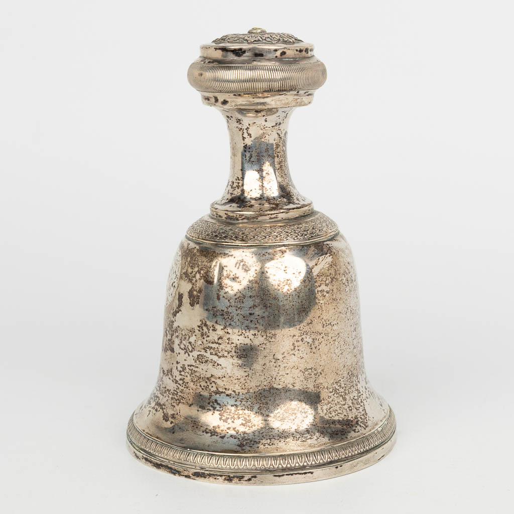 A table bell with silver body and with metal bell. (H:16cm)
