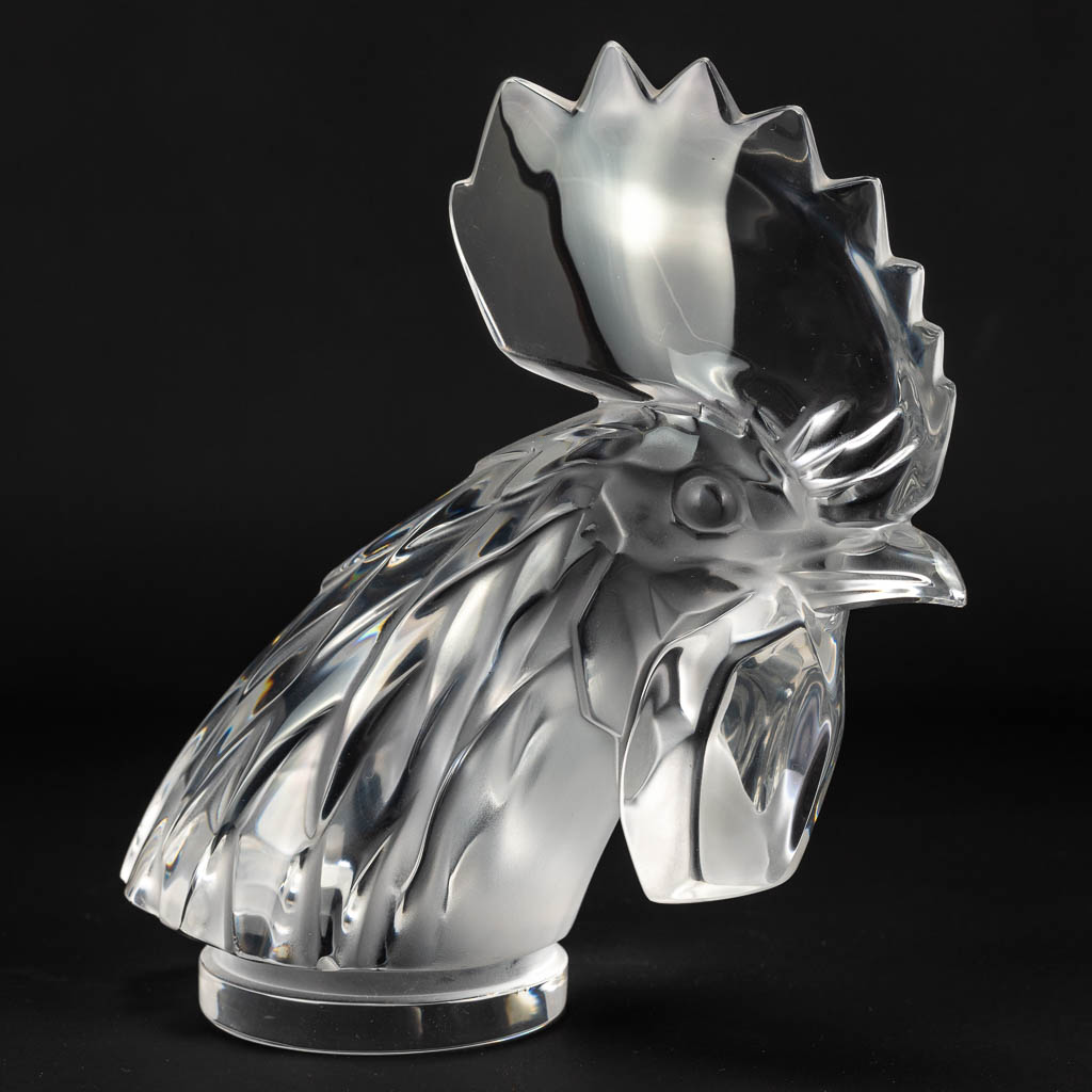 A bust of a rooster made of crystal and marked Lalique Franc