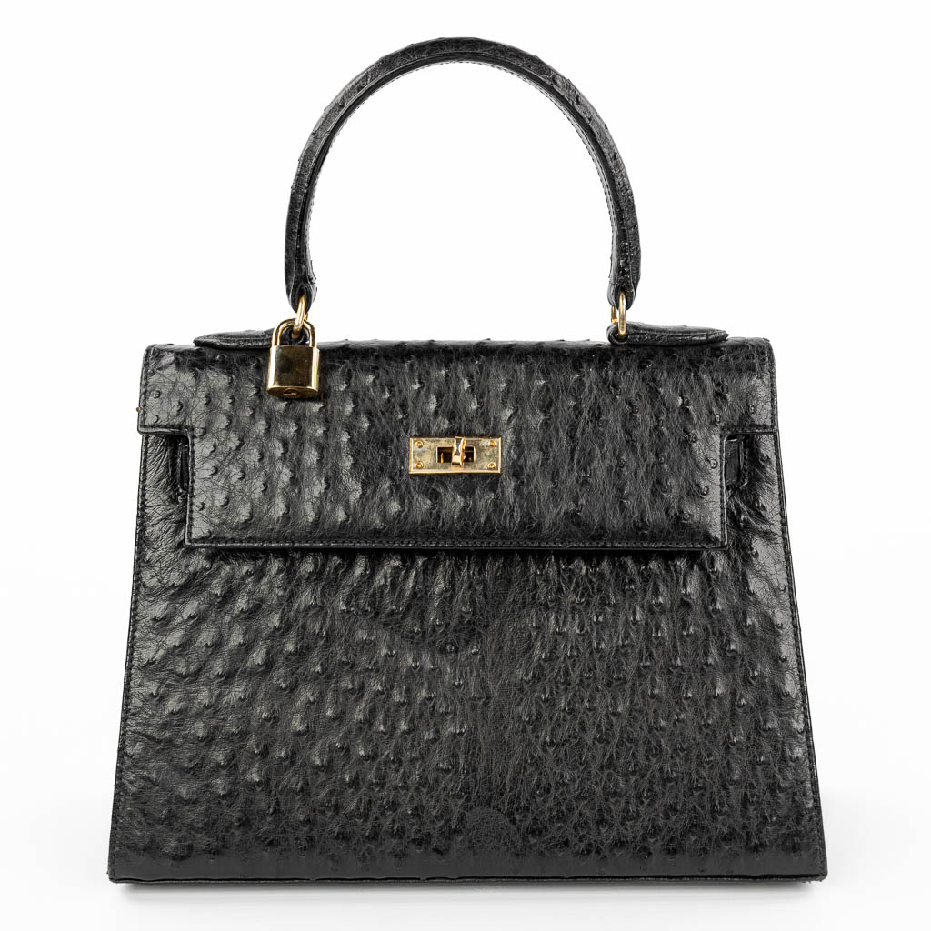 A handbag made of black ostrich leather and made by Olivier Gurtner in Switzerland. (H:28cm)