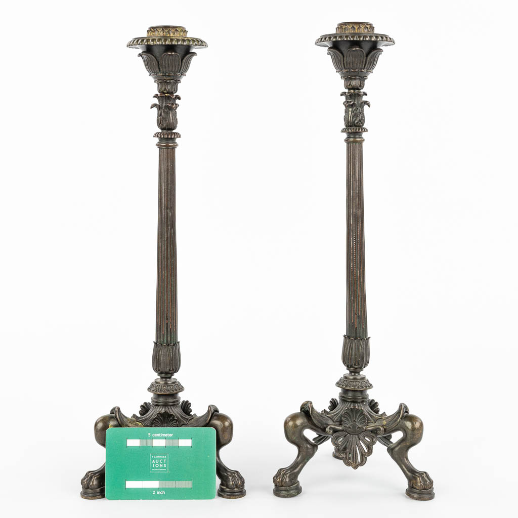A pair of candlesticks made of bronze in empire style, probably made by Barbedienne. (H:36,5cm)